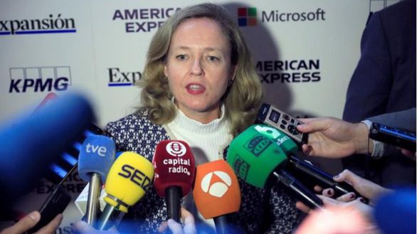 Calviño dice no tener prisa por vender la participación en CaixaBank-Bankia