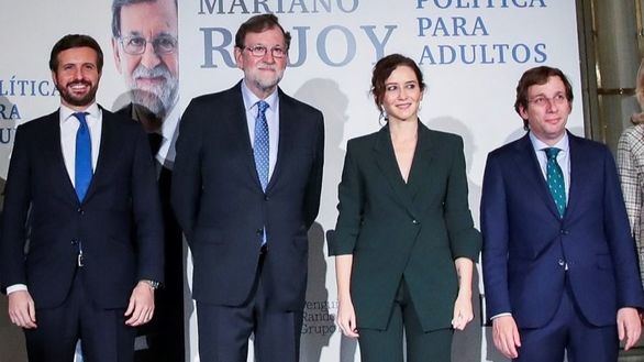 Casado, Ayuso y Almeida, juntos en la presentación del libro de Rajoy