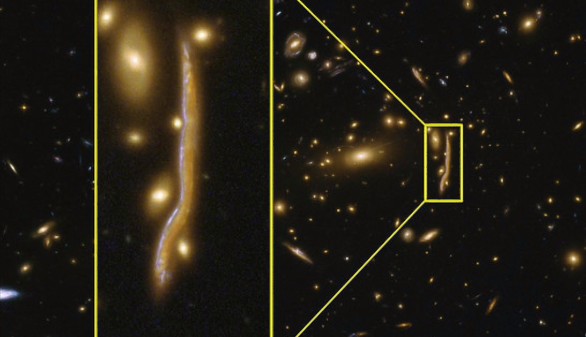 La 'serpiente cósmica' es la imagen de una galaxia distante, desviada por una fuerte lente gravitacional. La 'serpiente cósmica' es la imagen de una galaxia distante, desviada por una fuerte lente gravitacional.