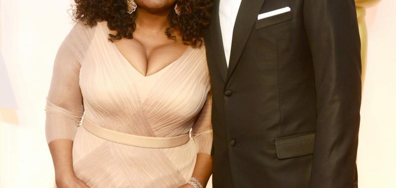 Oprah Winfrey y su compañero Stedman Graham