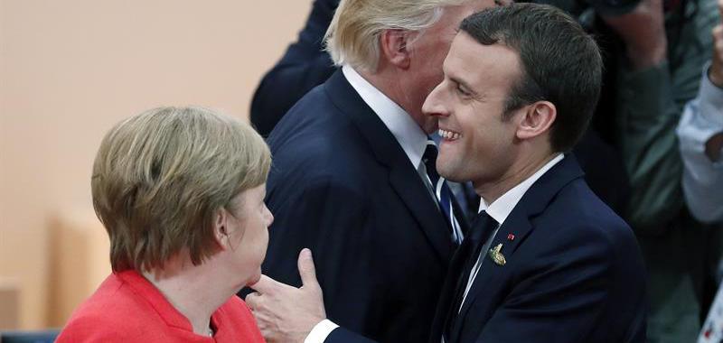 Emmanuel Macron, Angela Merkel y Donald Trump